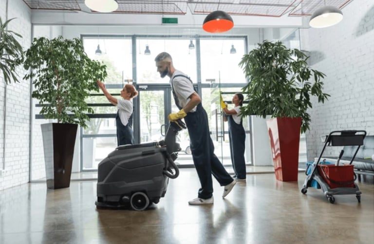 Man using floor scrubbing machine
