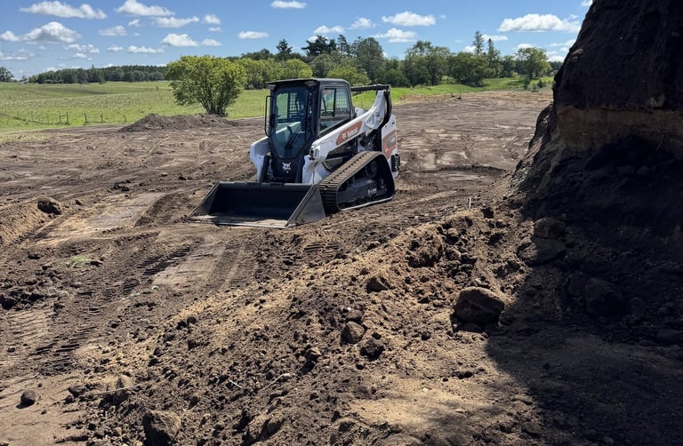 skid steer moving dirt