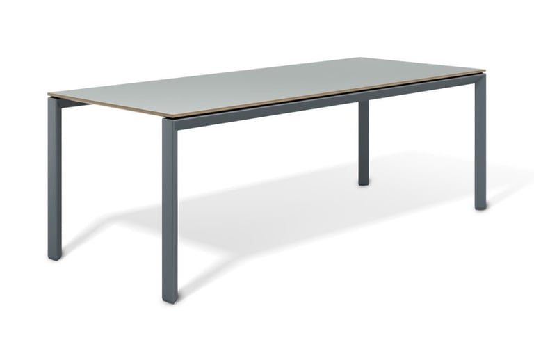 Bapsule :  a Metal table with a Sheet top and a table top with a table top