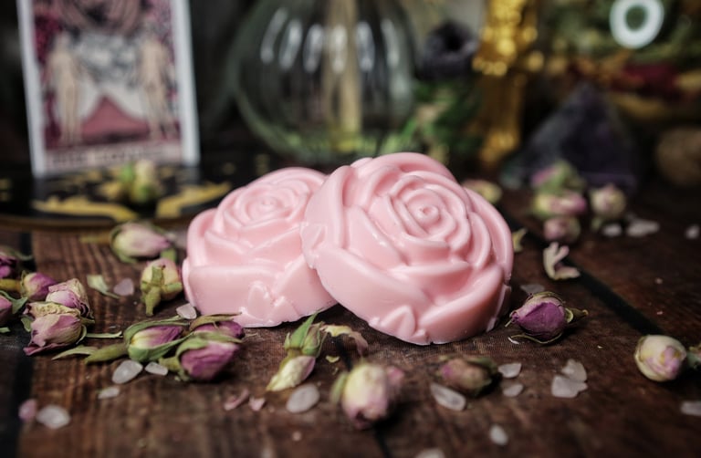 Rose shaped soaps surrounded by miniature roses