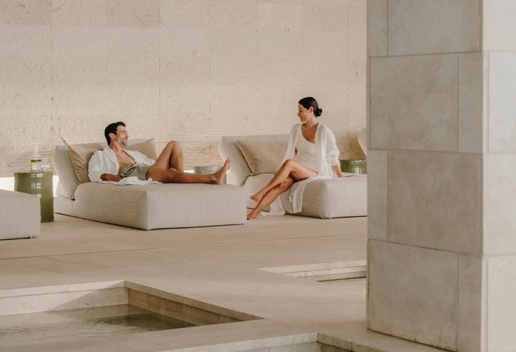 Guests relaxing in a luxury hotel spa thermal area — hotel spa operational turnaround and revenue re
