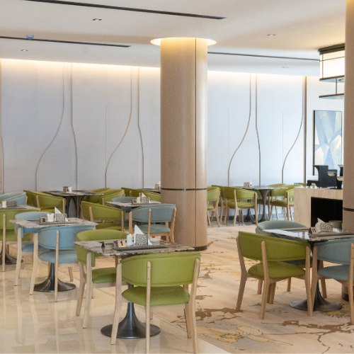 Dining area at Rosa Grand Granada Riyadh serving international cuisine