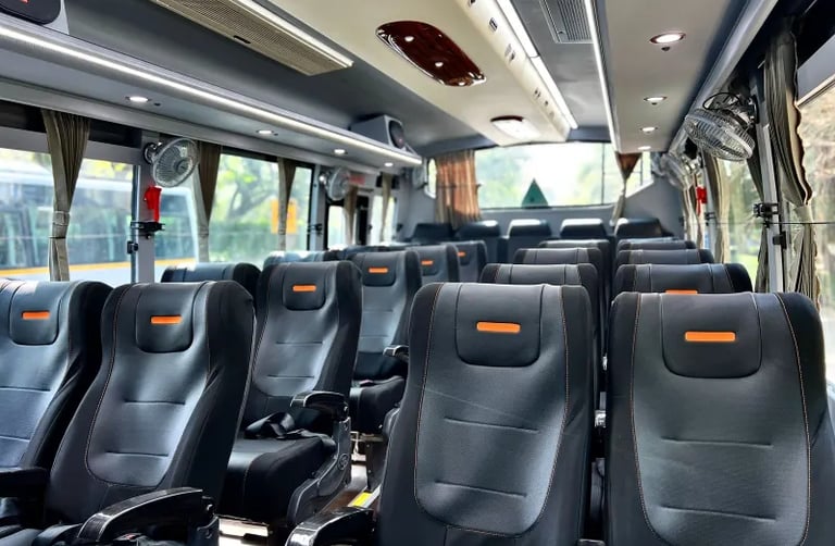 27 seater luxury bus interior for small group travel in Delhi NCR