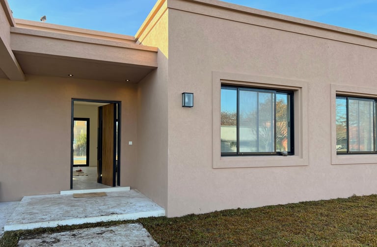 a house with a large window and a door