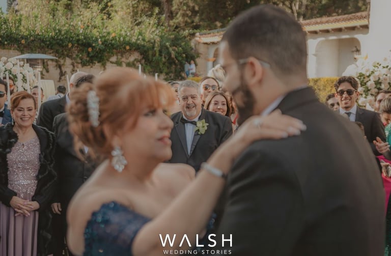 Antigua Guatemala Wedding Photographer-Groom dancing with mom