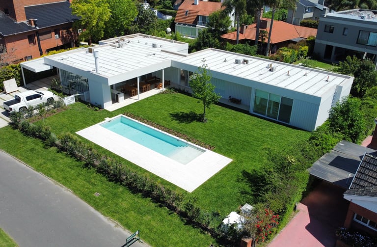 a house with a pool and a swimming pool