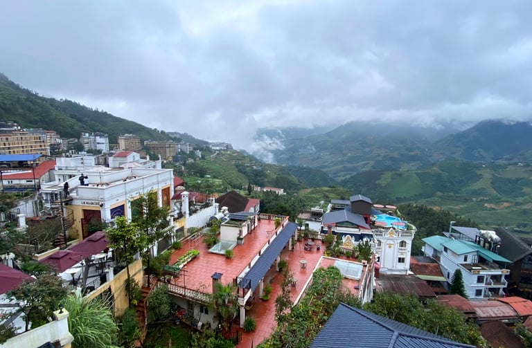 a view of a city with a mountain in the background