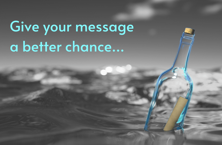 On-hold Message in a coloured bottle bobbing in a greyscale ocean