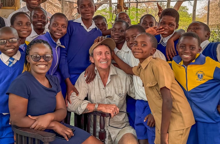 Dave Bennett having fun with school children