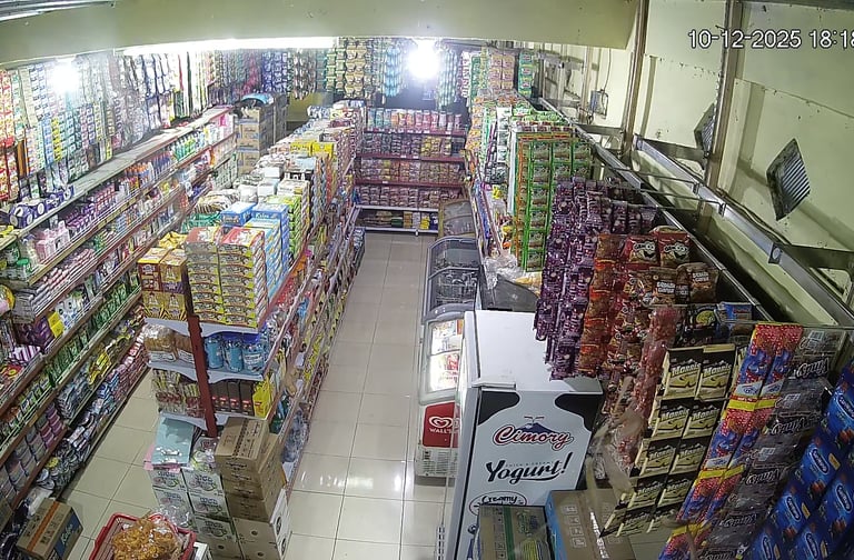 a store with a carton of food and drinks