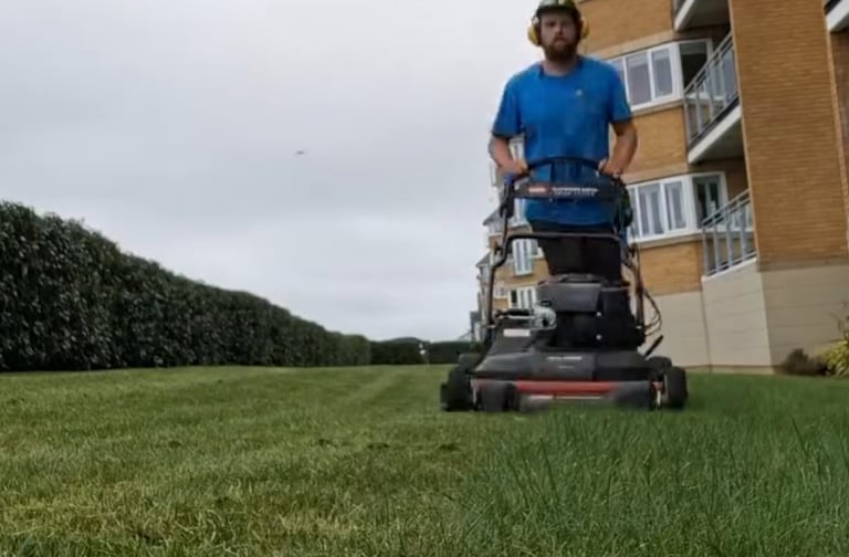 Lawn mowing with a mulching mower at Sovereign Harbour in Eastbourne