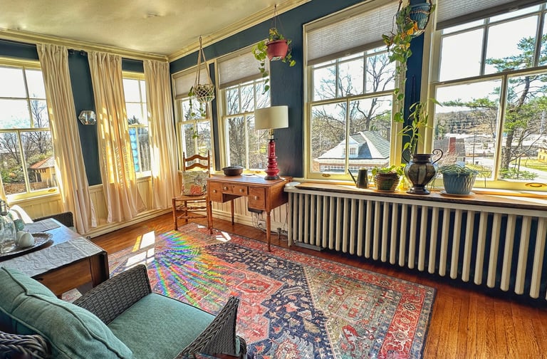 sunroom with view of windows 2123 rivermont apartments