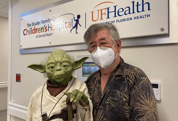 Founder of The Force for Good, "Yoda Guy" Nick Maley takes Yoda to uplift  kids in cancer ward.