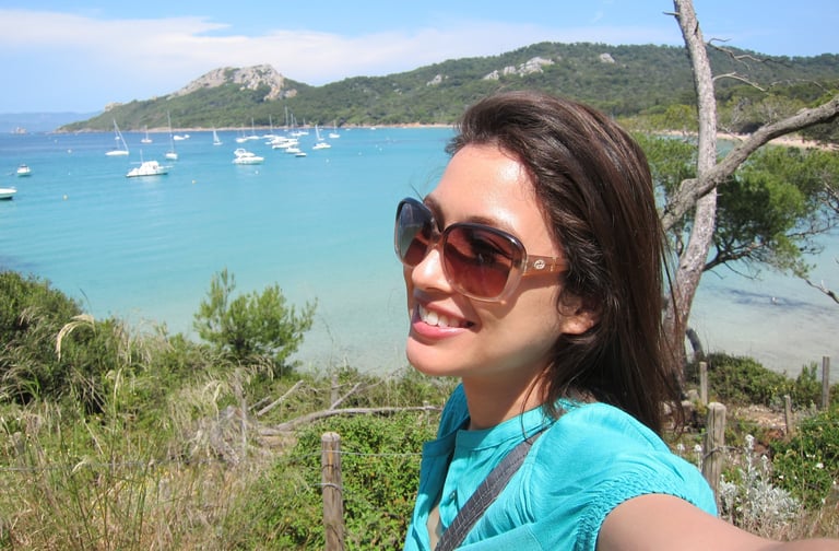 a woman taking a selfie with her cell phone