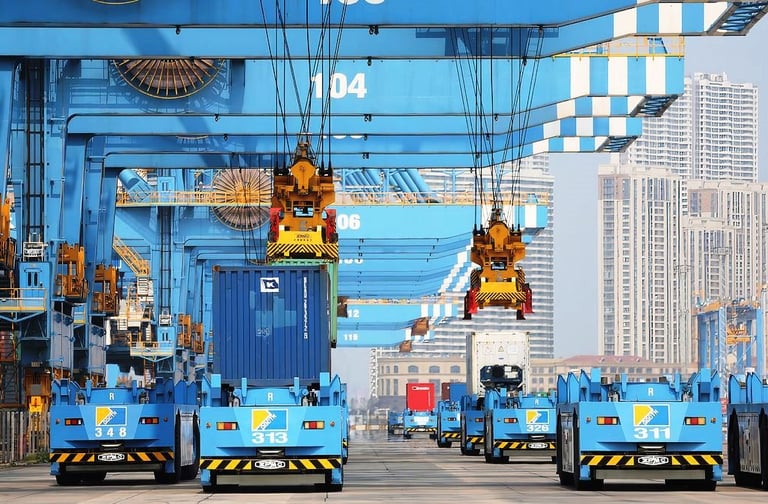 qingdao port china's fully automated port, a group of cranes are being loaded with cargo