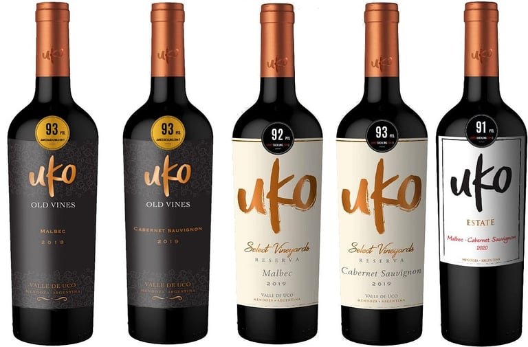 a variety of wine bottles with a variety of wines