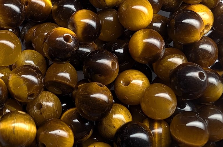 Perles en œil de tigre, aux reflets chatoyants dorés et bruns