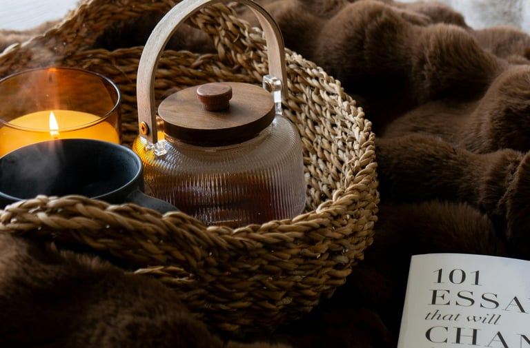 Gentle magnesium wind-down ritual with herbal tea, journal, and candle for bedtime calm