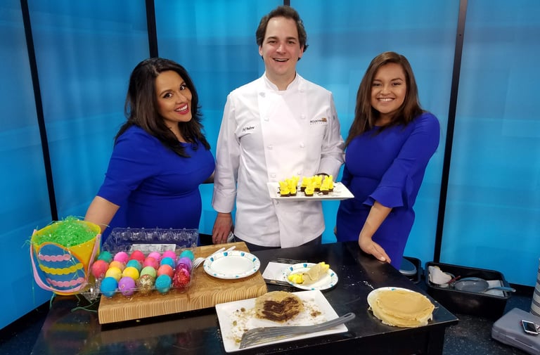 Chef Andrew cooking on a morning TV show.
