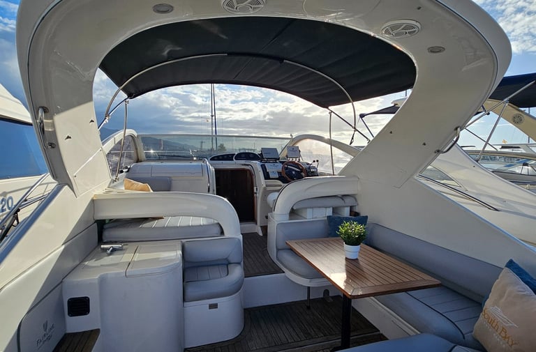 a boat with a couch and a table