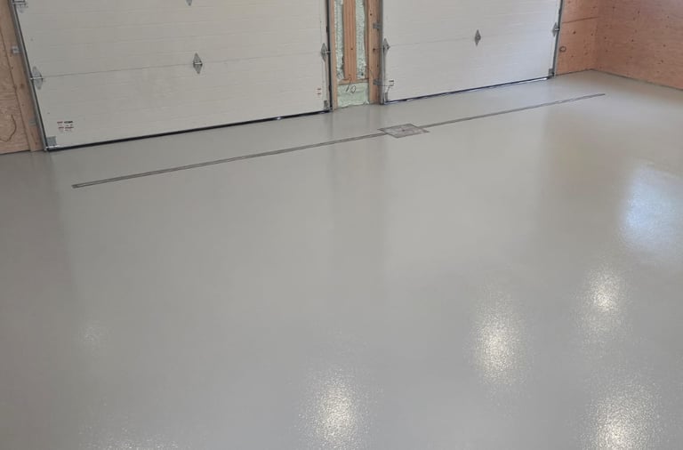 Solid colour epoxy floor with anti-slip oxide rolled in with a uv-stable satin urethane topcoat