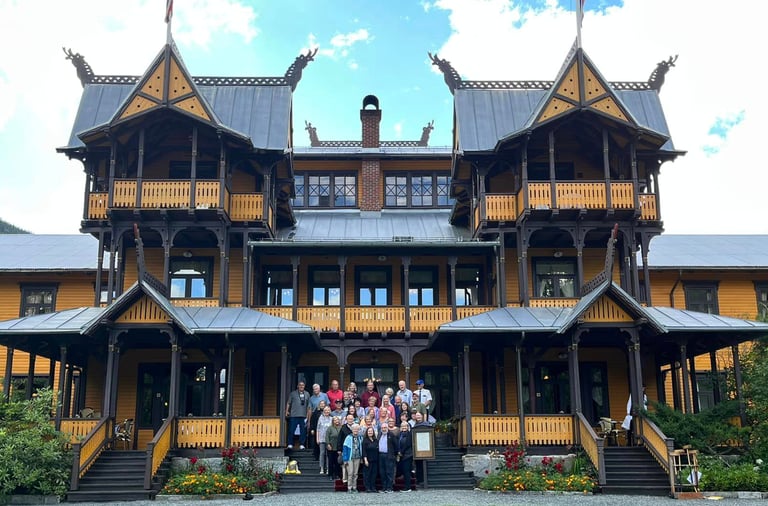 telelaget tour group in front of a  building with midieval  architechture