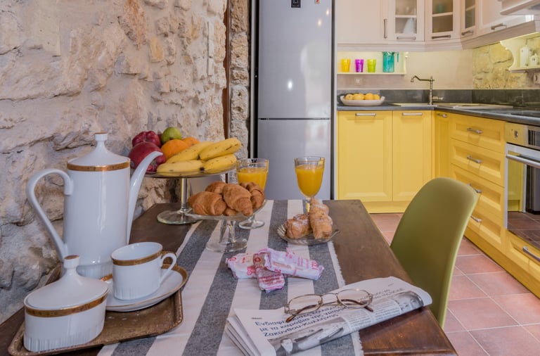 Fully equipped modern kitchen in traditional stone house of Zakynthos