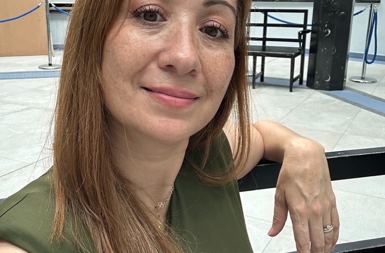 a woman in a green shirt and a black and white shirt