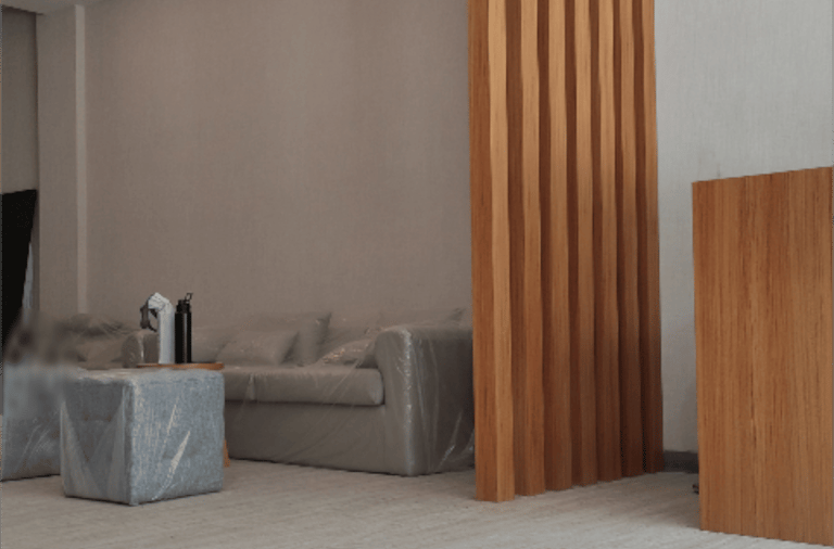 a living room with a couch and a television