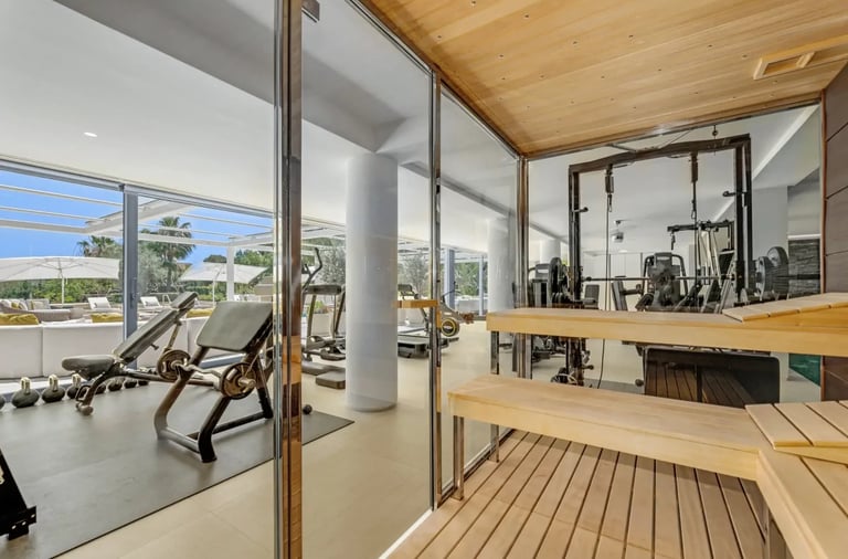 Spa area with loungers and wood ceiling at Villa Serenity