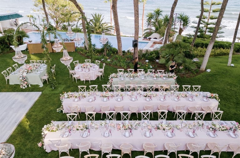 Aerial view of luxury destination wedding setup by the sea at Villa El Rincon Marbella