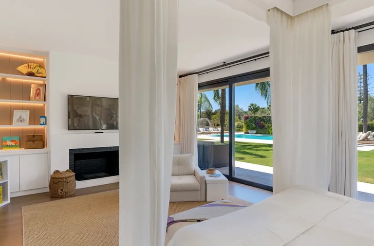 suite with terrace access and pool views at Villa El Olivo, Marbella