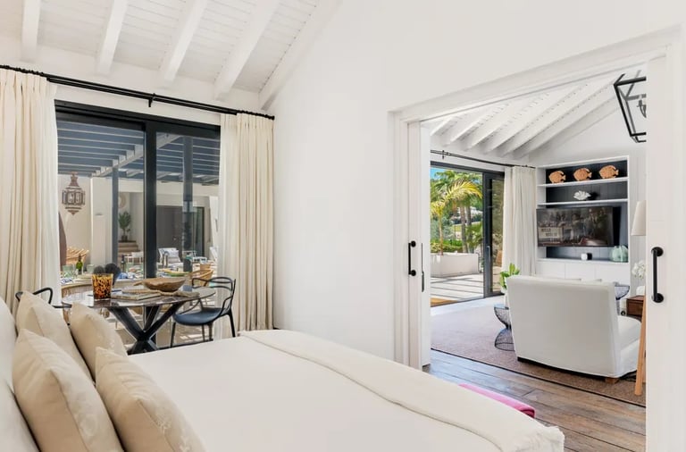 Bright bedroom with terrace access and pool views at Villa El Olivo, Marbella