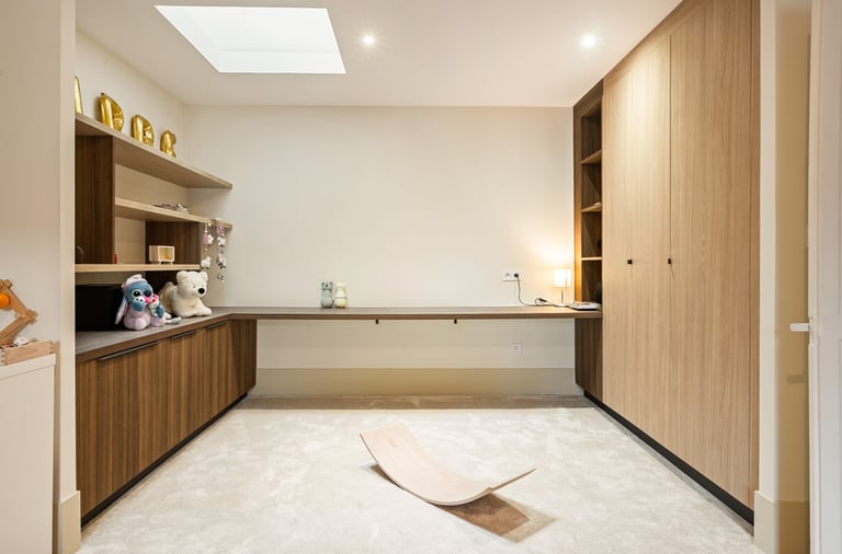 a room with a wooden floor and a wooden desk