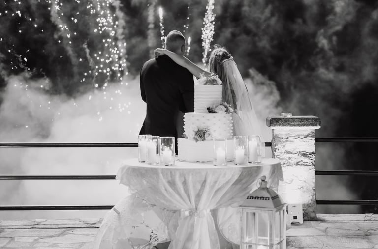 a bride and groom share a kiss at their wedding