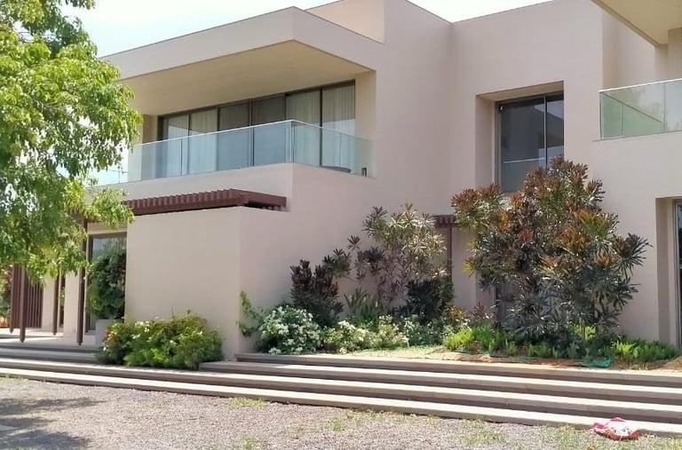 a house with a balcony and a balcony with a balcony