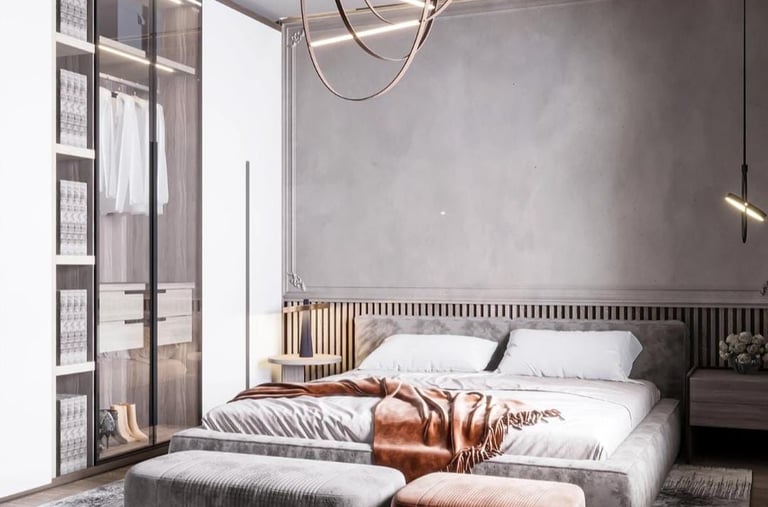 a bedroom with a large bed and a couch Nour Nagy Designs