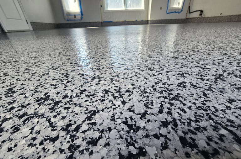 Black and white decorative flake garage floor coating with durable seamless finish
