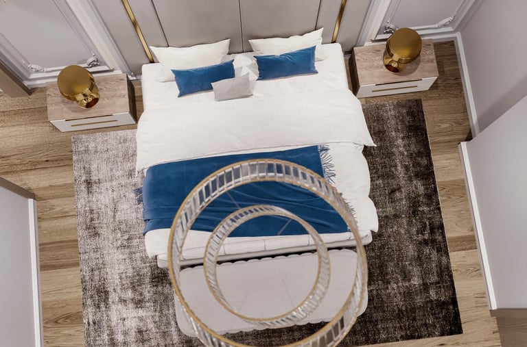 a bedroom with a bed and a chair Nour Nagy Designs