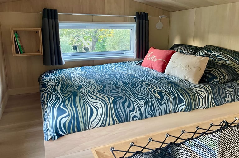 Chambre 2 avec son filet de détente pour enfants et parents