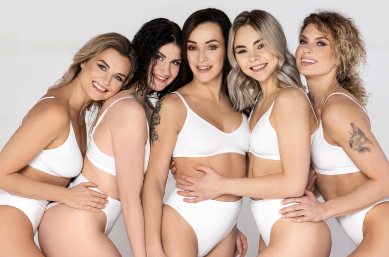 a group of women in white underwears Textil-A