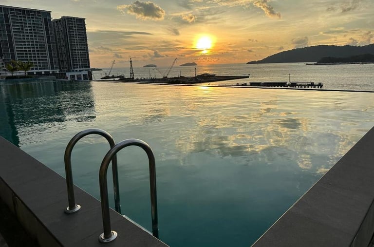 Infinity pool with stunning sea view at Mixma Suites apartment hotel in Kota Kinabalu