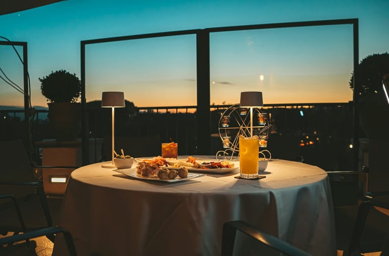 Romantic dinner on the sunset terrace with European cuisine