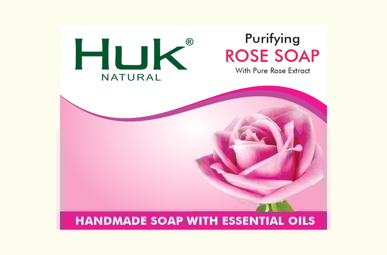 a soap bar soap with a pink rose on it