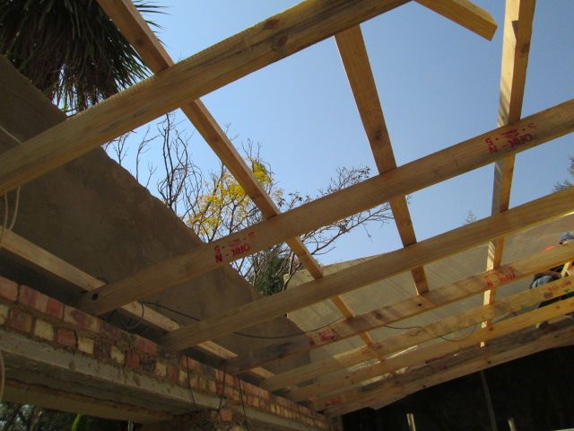 Construction of new roof structure after removal of damaged structure Krugersdorp Environmental Pro Construction