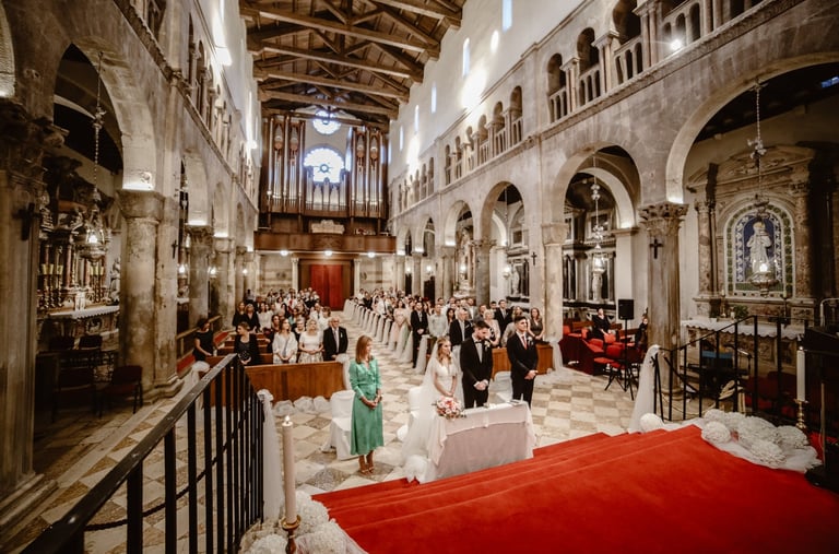 The photo shows a glorious wedding ceremony in Zadar Cathedral.
