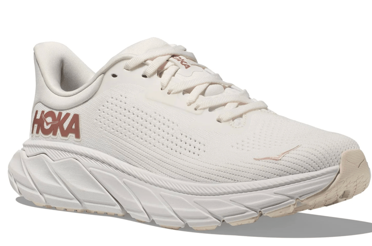 Hoka Arahi 7 in White/Rose Gold — the most visually striking and magazine-ready colorway.