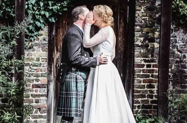bride whispering to groom