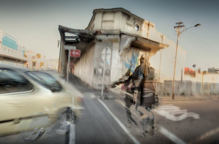 Energetic abstract photo of a cyclist, car, and street corner in Salt River, Cape Town, blending urban textures and movement.