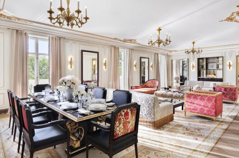 Royal Suite Dining & Lounge – Opulent dining and living area with classic décor and plush furnishings.